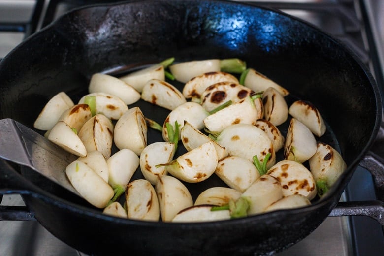 turnips cooking in the pan