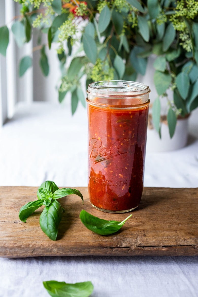 A fast and easy recipe for Marinara Sauce using fresh or canned tomatoes, with garlic, onions and oregano and basil cooked on the stovetop in under 30 minutes. Use this classic Marinara Sauce on pasta, pizza or meatballs. Freeze for the winter months! 