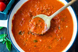 A fast and easy recipe for Marinara Sauce using fresh or canned tomatoes, with garlic, onions and oregano and basil cooked on the stovetop in under 30 minutes. Use this classic Marinara Sauce on pasta, pizza or meatballs. 