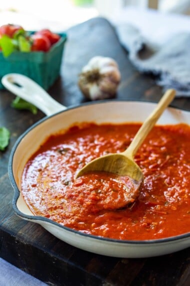 A fast and easy recipe for Marinara Sauce using fresh or canned tomatoes, with garlic, onions and oregano and basil cooked on the stovetop in under 30 minutes. Use this classic Marinara Sauce on pasta, pizza or meatballs.