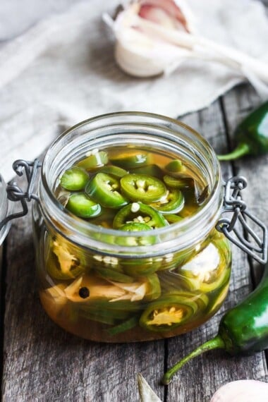 How to make easy homemade Pickled Jalapeños -a deliciously tangy, sweet and spicy accent to tacos, burgers, soups, burritos, and more!