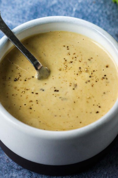 Creamy, tangy classic Caesar Salad Dressing is hard not to love.  This recipe is perfect for our Caesar salad, pasta salad, or as a dip.  A fresh & delicious alternative to store-bought dressing!