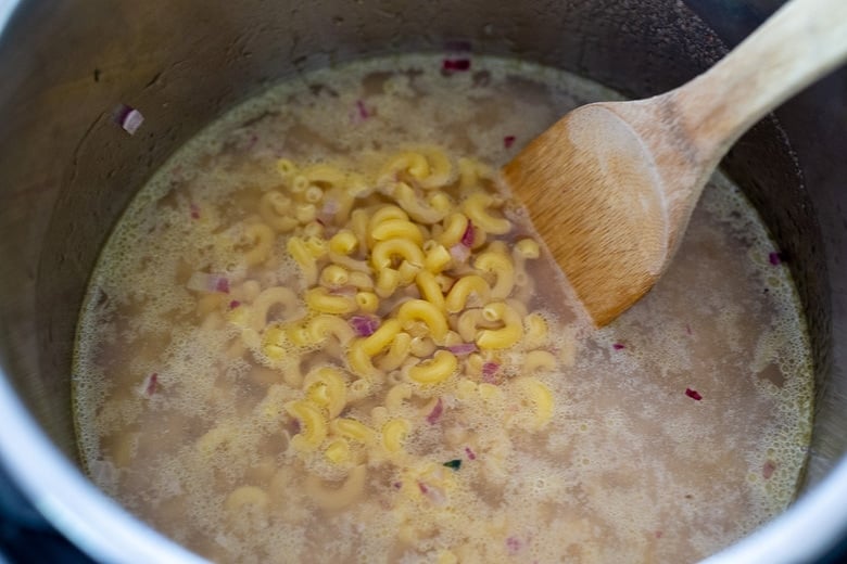 add water, salt and macaroni to the instant pot