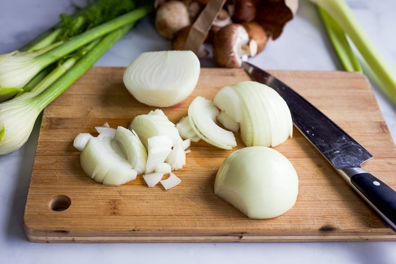 Chopping onions.