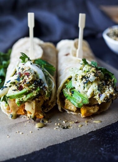 A delicious vegan recipe for Miso Tofu Wrap with Roasted Winter Squash, Baked Miso Tofu, Asian Slaw, Avocado, Furikake and flavorful Miso Dressing. #veganwrap #wrap #tofu
