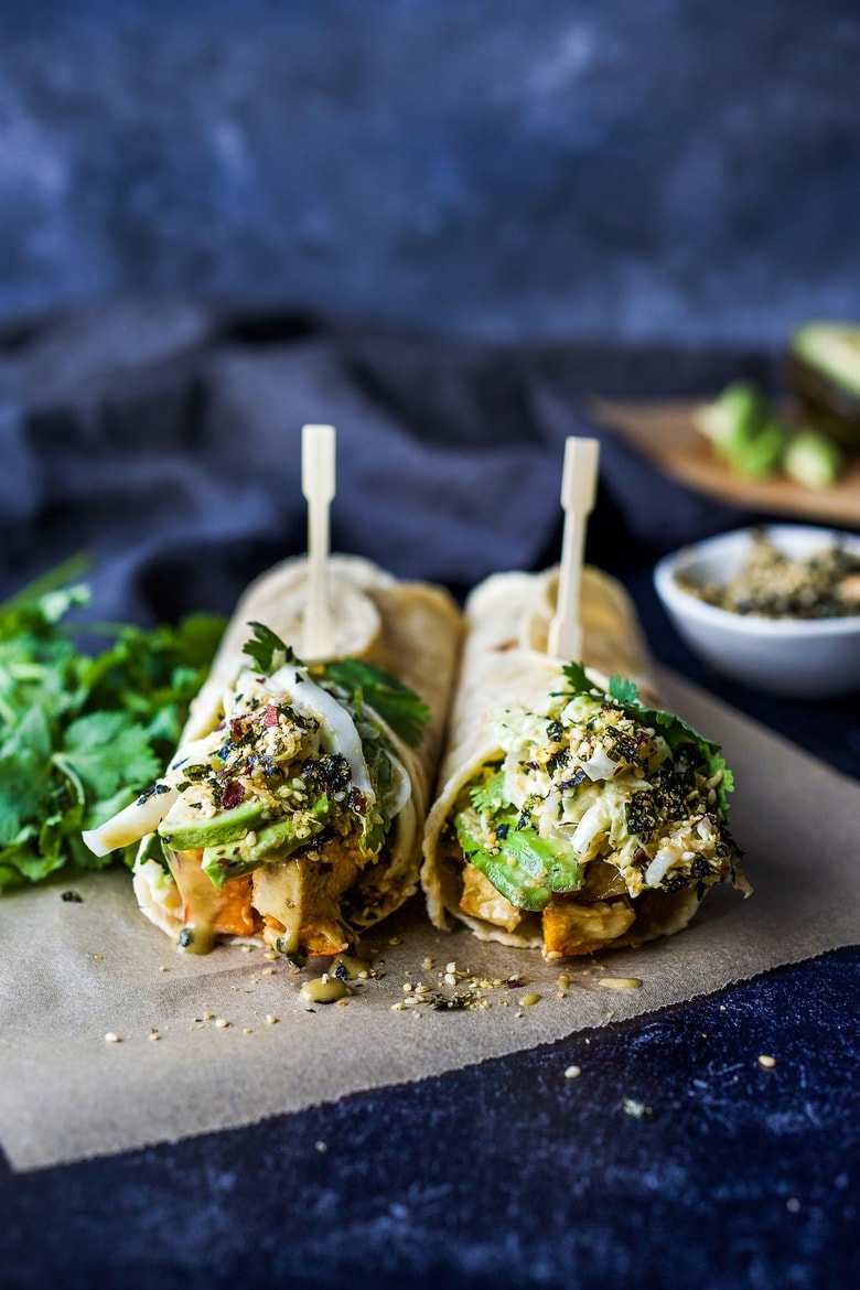 A delicious vegan recipe for Miso Tofu Wrap with Roasted Winter Squash, Baked Miso Tofu, Asian Slaw, Avocado, Furikake and flavorful Miso Dressing. #veganwrap #wrap #tofu