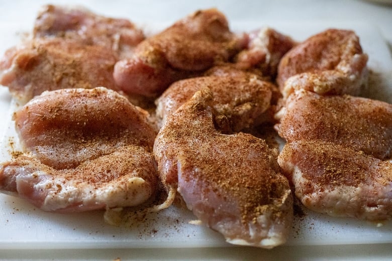 Season the chicken with spices