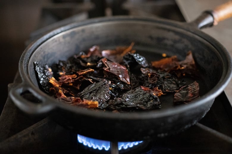 toast chilies in a dry skillet to release oils.