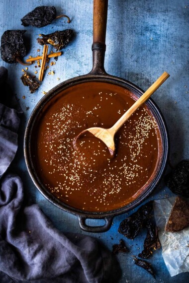 How to make Mole Negro Sauce- a deep, smoky, slightly spicy sauce that hails from Mexico made with dried black chilies, warming spices and a hint of bittersweet chocolate. Trust me, you'll want to put this on everything. Vegan! Make this in 35 minutes!