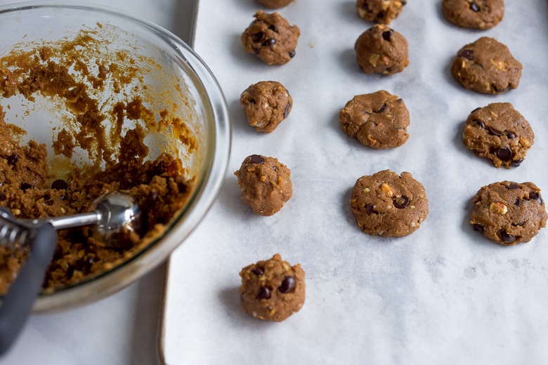 scooping cookies on to the tray