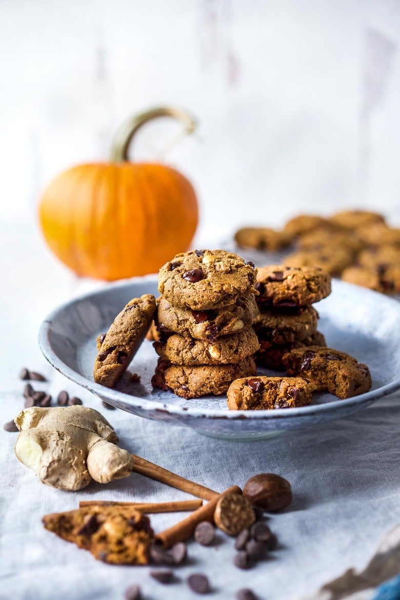 One-bowl Vegan Pumpkin Cookies with hazelnuts and chocolate chips are lightly sweetened with coconut sugar and accented with fresh ginger.  These cookies are healthy, delicious, gluten-free and can be made in 30 minutes!  Serious crowd pleasers, take these to the potluck and make new friends.