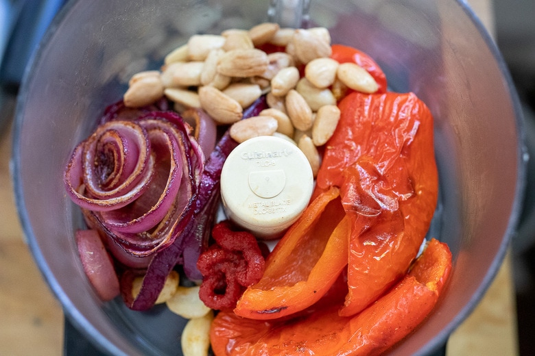 romesco sauce ingredients being blended in a food processor or blender.