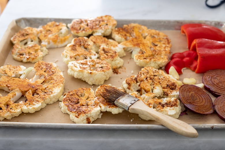 brush the marinade over the cauliflower