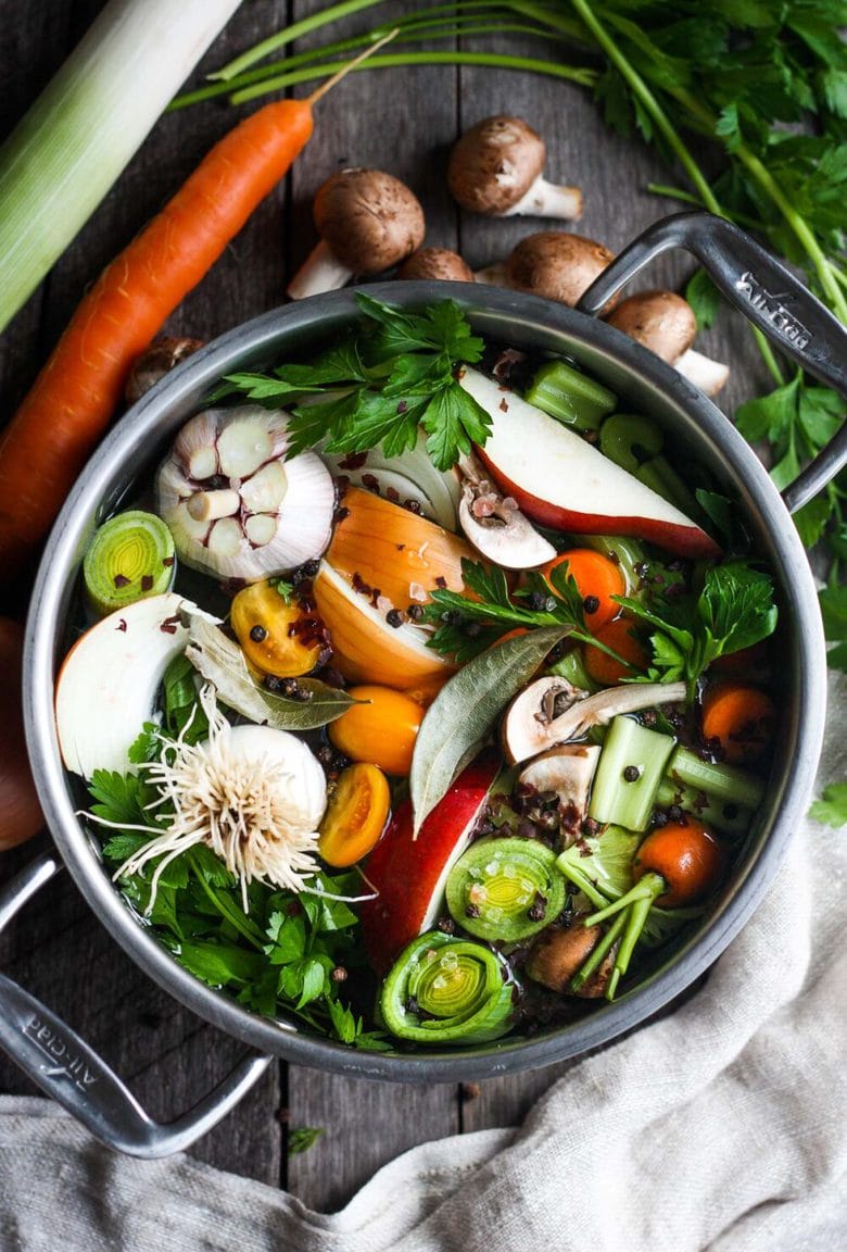 How to make Vegetable Broth! A nutritious and deeply flavorful recipe for Vegetable stock to enhance your soups, risottos, sauces, and more. Adaptable and easy to make! #vegetablestock