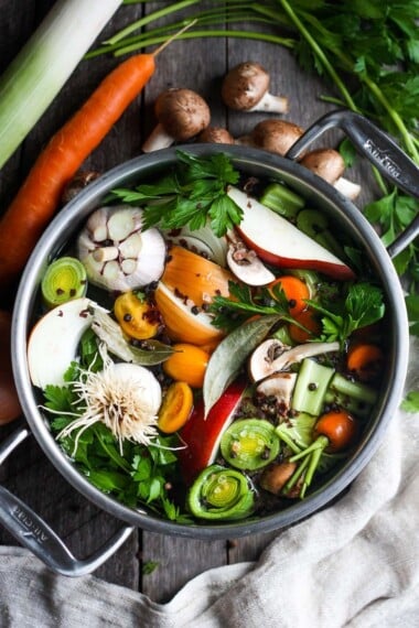 How to make Vegetable Broth!  A nutritious and deeply flavorful recipe for Vegetable stock to enhance your soups, risottos, sauces, and more.  Adaptable and easy to make! #vegetablestock