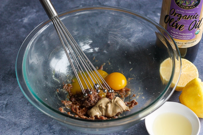 adding ingredients to the bowl