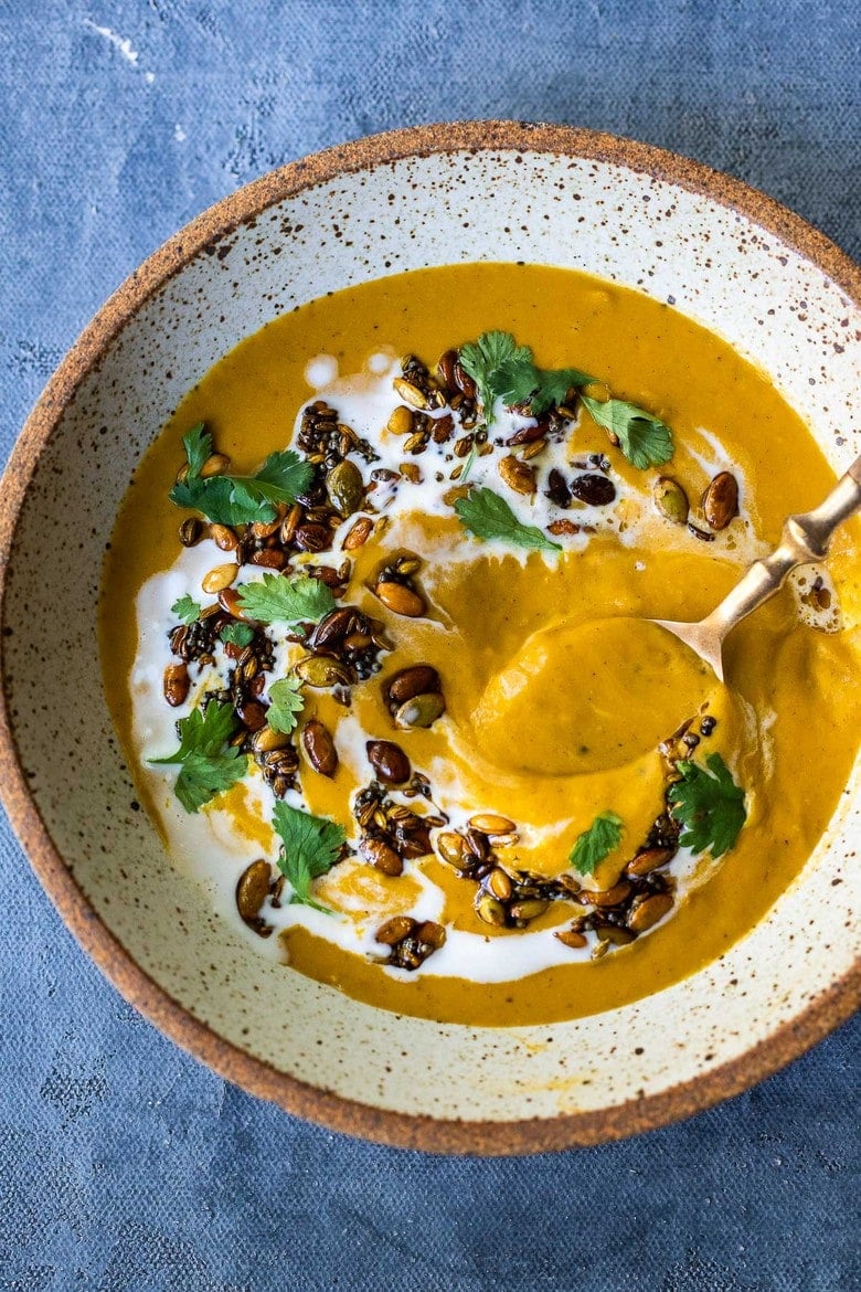 Thick and creamy Pumpkin soup with coconut milk, and warming Indian spices. Vegan and Gluten-free. Use roasted pumpkin or canned pumpkin puree!