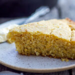 This recipe for Cornbread is homey, delicious, and full of wholesome cornmeal flavor with an irresistible crusty edge. Super easy to make! Perfect for serving with soups, chili's, stews.