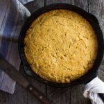 This Cornbread recipe is homey, delicious, and full of wholesome cornmeal flavor with an irresistible crusty edge.  Bake it in a skillet or baking dish and it's ready in just 35 minutes! Perfect for serving with soups, chili's, stews. Vegan-Adaptable (see recipe notes!). 