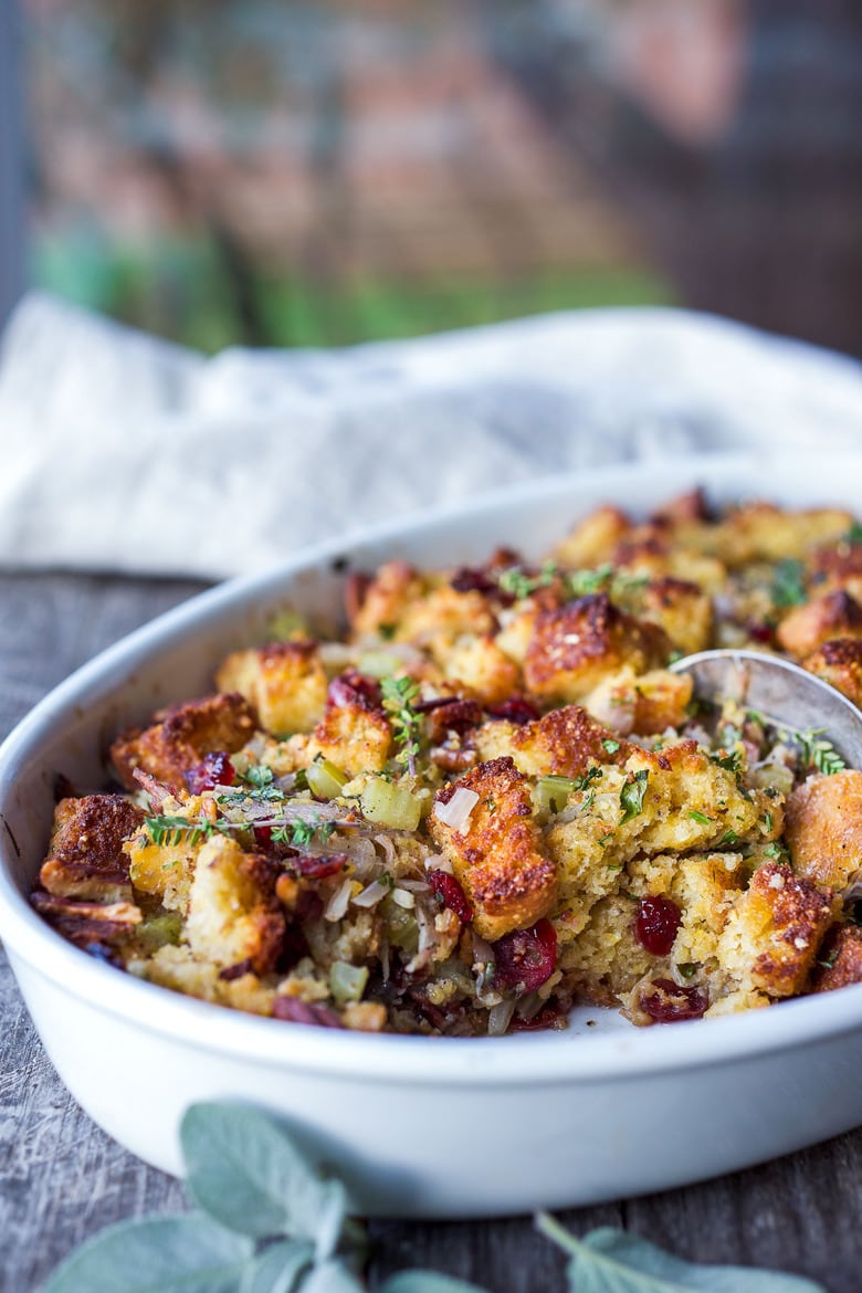 Cornbread Stuffing with Fennel Bulb, Dried Cranberries, and Toasted Pecans is richly flavored and so delicious!  The perfect addition to your holiday table.  This recipe can easily be made a day ahead of baking.  Vegetarian and Gluten-Free adaptable.