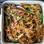 This healthy Green Bean Casserole is made with fresh green beans, oven-baked crispy shallots, and a creamy mushroom sauce that is VEGAN! Easy, healthy and delicious, worthy of the holiday table.