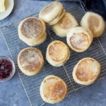 How to make homemade Sourdough English Muffins using sourdough starter (no yeast!).  They raise overnight and are cooked on the stovetop in the morning.   Tender, delicious and easier to make than you might think!  Vegan adaptable.