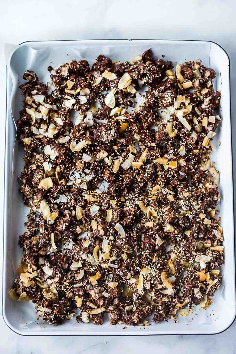 Cashew Ginger Chocolate Bark with Toasted Coconut and Sesame is a divinely delicious snack!   Perfect for gifts and company.  Easy to make in under 30 minutes!  Adaptable, vegan and gluten-free! #chocolatebark #veganbark