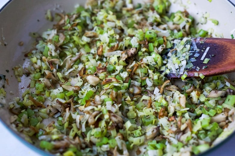 mixing all sautéed veggies