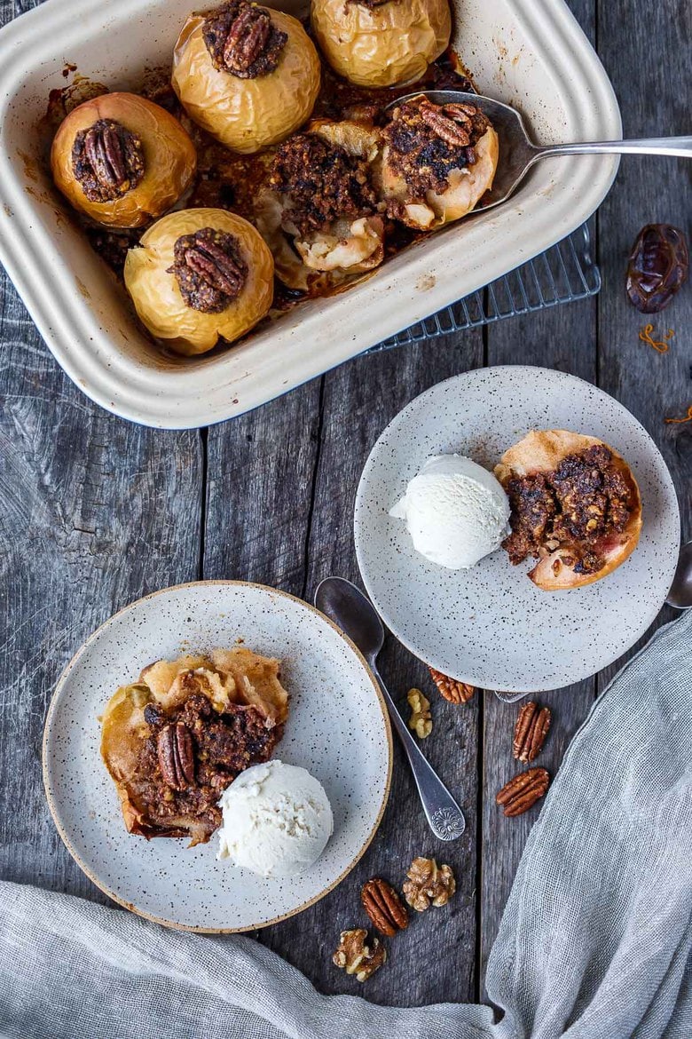 Healthy and delectable Baked Apples with Maple Syrup are filled with spiced toasty nuts, dates and dried cherries.  Serve for dessert or brunch.  No refined sugar, vegan and gluten-free!  