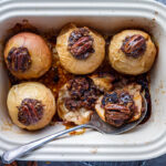 Healthy and delectable Baked Apples with Maple Syrup are filled with spiced toasty nuts, dates and dried cherries. Serve for dessert or brunch. No refined sugar, vegan and gluten-free!
