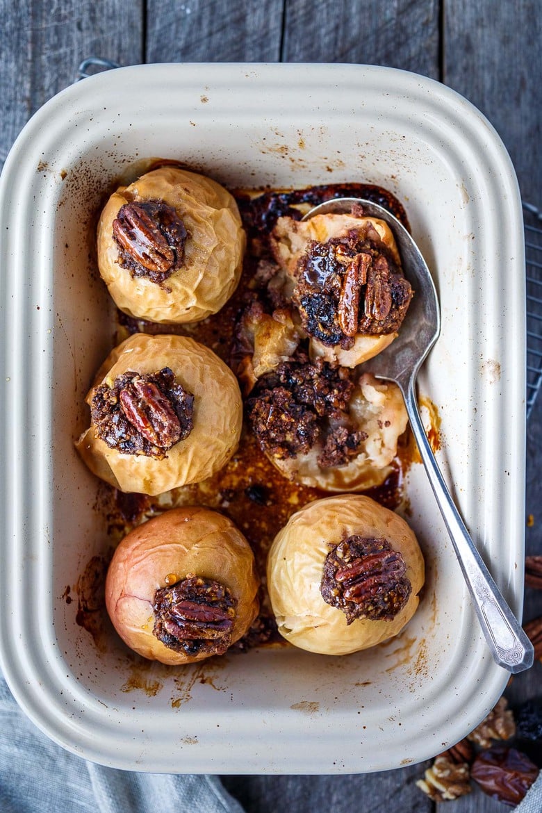 Healthy and delectable Baked Apples with Maple Syrup are filled with spiced toasty nuts, dates and dried cherries.  Serve for dessert or brunch.  No refined sugar, vegan and gluten-free!  