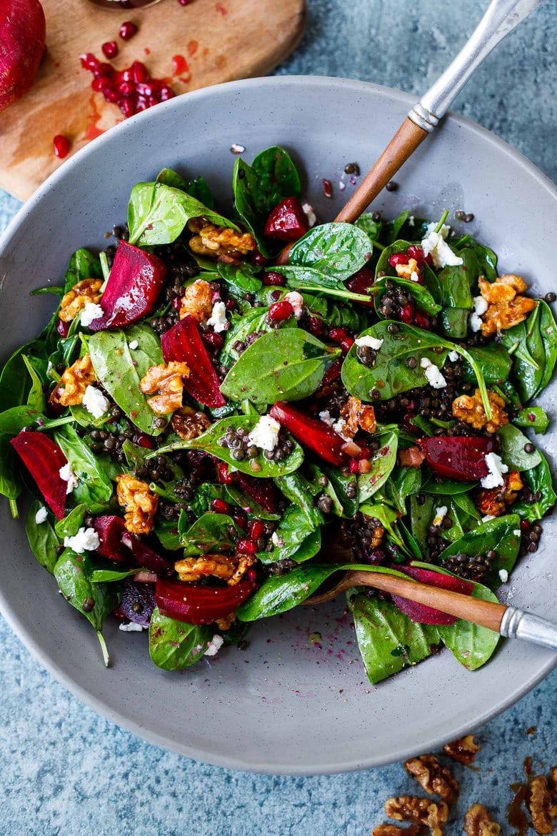 Beet, Lentil and Spinach Salad with Pomegranate Dressing, topped with maple walnuts and crumbled goat cheese. 