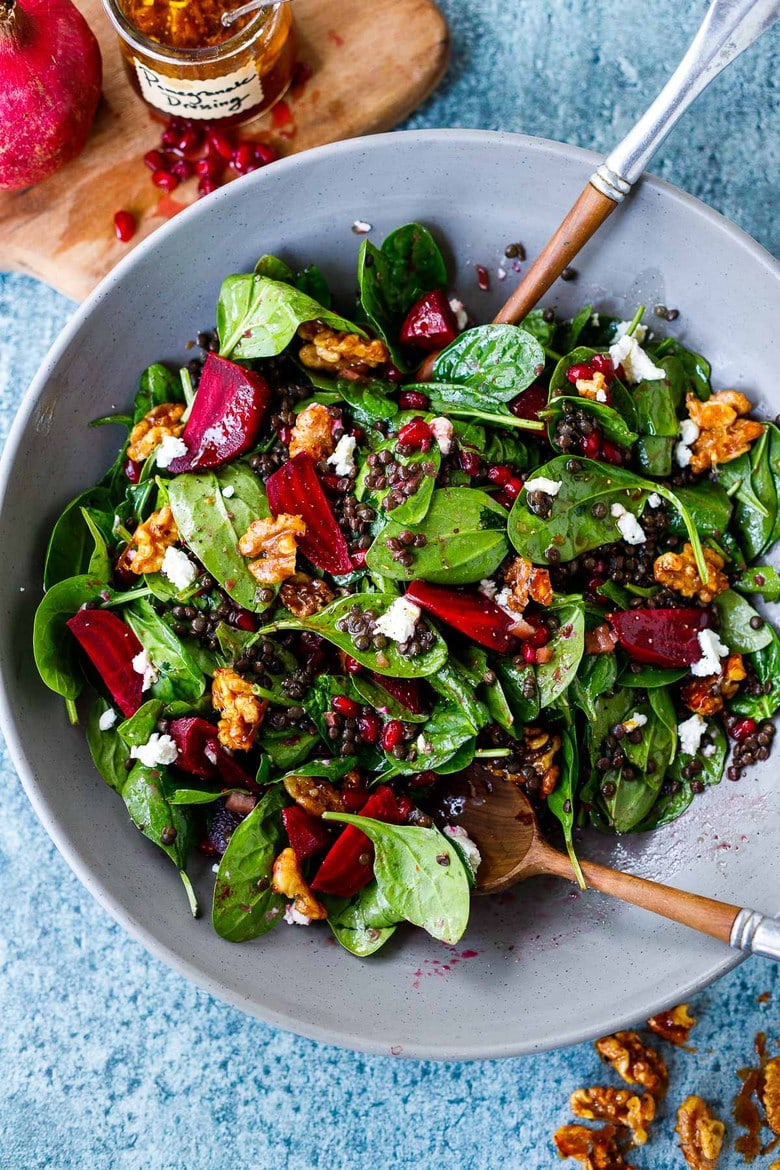 Beet, Lentil and Spinach Salad with Pomegranate Dressing, topped with maple walnuts and crumbled goat cheese.