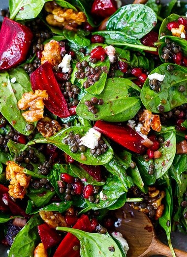 Beet, Lentil and Spinach Salad with Pomegranate Dressing, topped with maple walnuts and crumbled goat cheese. 