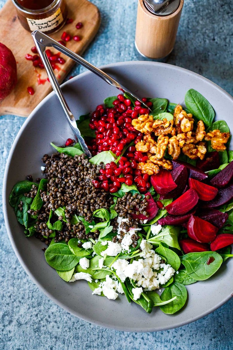 Beet, Lentil and Spinach Salad with Pomegranate Dressing, topped with maple walnuts and crumbled goat cheese. 