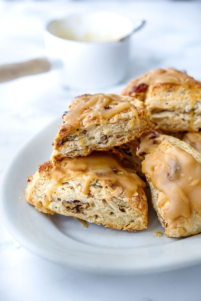 Golden Maple Pecan Scones are flakey,  buttery, and tender with a delicious nutty flavor from the toasty pecans and real maple syrup. A fun bake, perfect for special gatherings, and holiday mornings. 