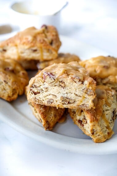 Buttery, flakey Maple Pecan Scones are tender and golden with a delicious nutty flavor from the toasty pecans and real maple syrup.