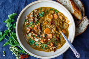 This vegan ecipe for Mediterranean Split Pea Soup is healthy and satisfying.  Simple clean ingredients create a hearty soup that tastes even better the next day!  Vegan and gluten-free.