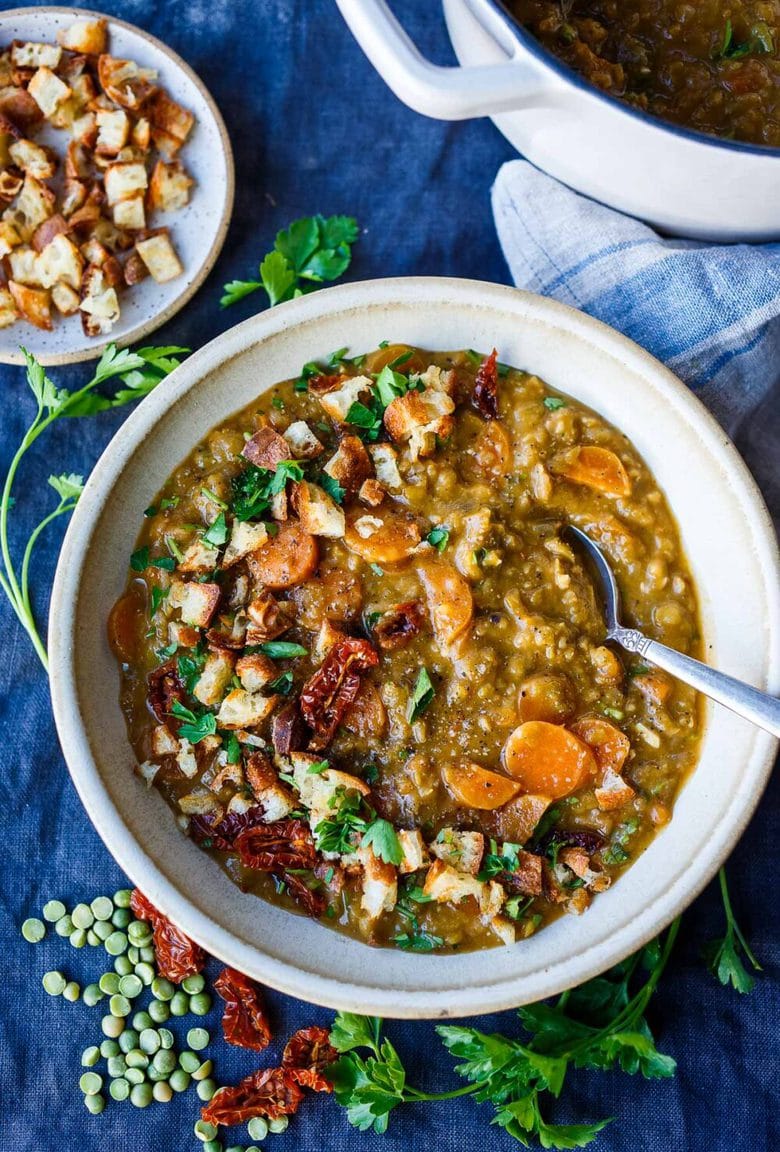 This recipe for Mediterranean Split Pea Soup is healthy and satisfying.  Simple clean ingredients create a hearty soup that tastes even better the next day!  Vegan and gluten-free.