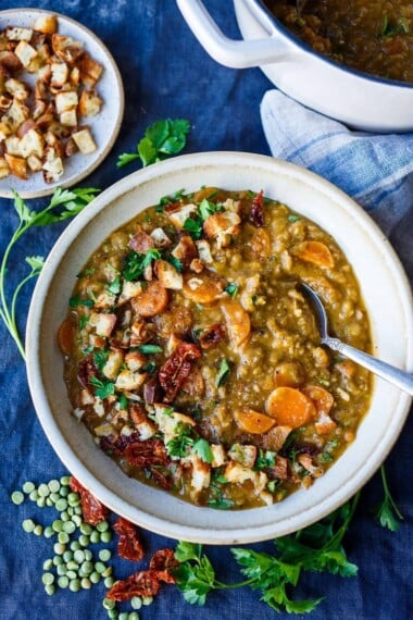 This recipe for Mediterranean Split Pea Soup is healthy and satisfying.  Simple clean ingredients create a hearty soup that tastes even better the next day!  Vegan and gluten-free.