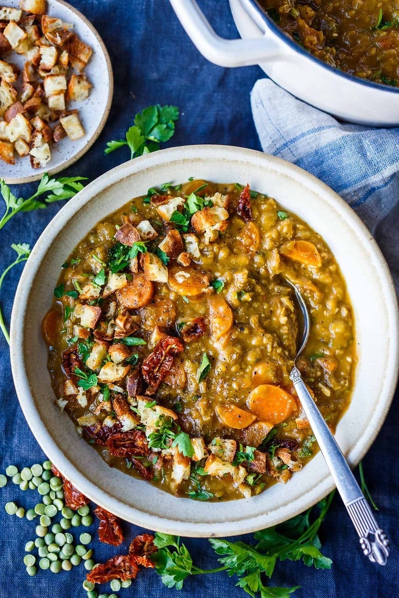 This recipe for Mediterranean Split Pea Soup is healthy and satisfying.  Simple clean ingredients create a hearty soup that tastes even better the next day!  Vegan and gluten-free.