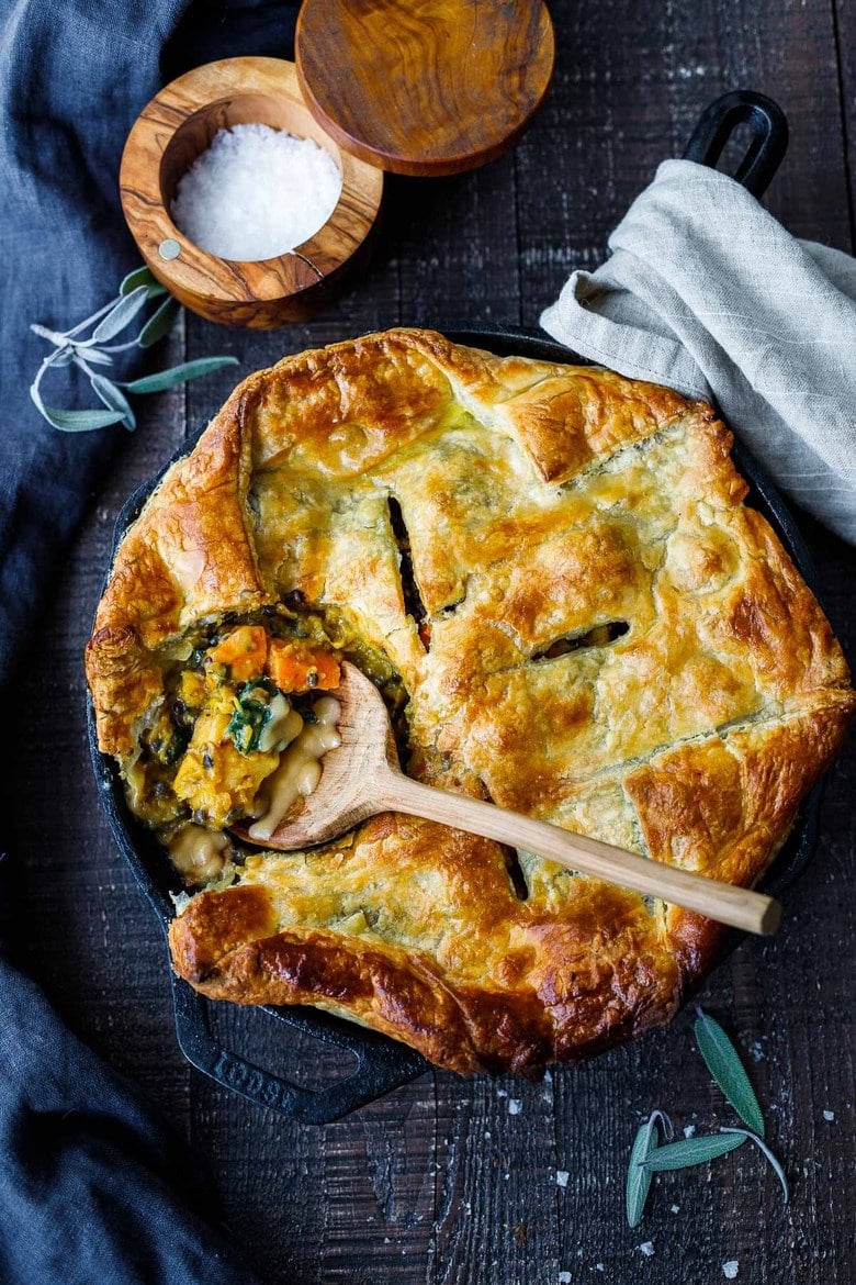 Vegan Pot Pie with Spring Vegetables is loaded with vibrant fresh veggies and flavorful herbs cooked in a delicious creamy lemon mustard sauce and topped with a flakey puff pastry crust.  