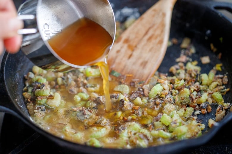 adding veggie broth