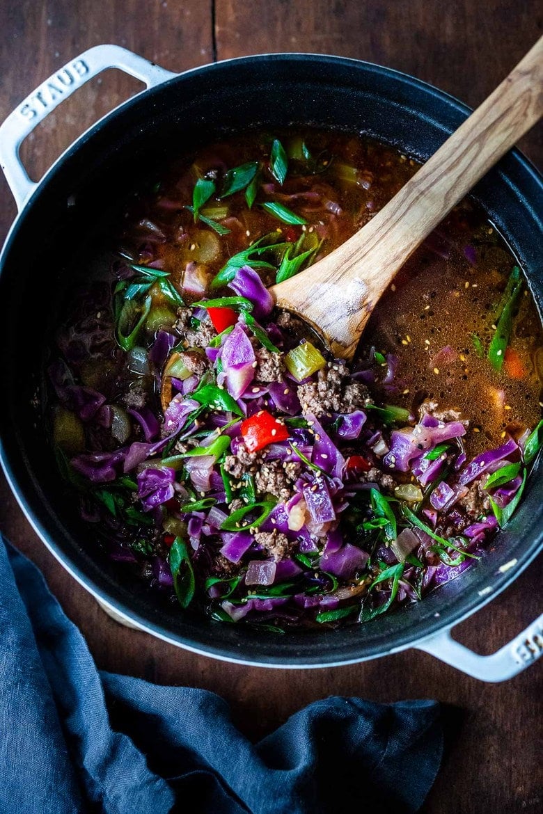 A fast and easy recipe recipe for Hot and Sour Cabbage Soup with ginger, scallions and your choice of ground meat (or sub plant-based ground meat). Vegan-Adaptable.  