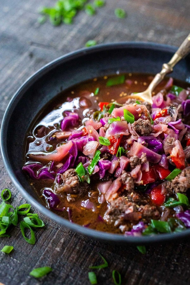A fast and easy recipe recipe for Hot and Sour Cabbage Soup with ginger, scallions and your choice of ground meat (or sub plant-based ground meat). Vegan-Adaptable.  