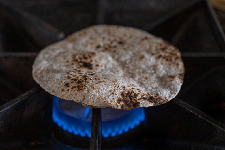 grill or toast the tortillas over a gas flame