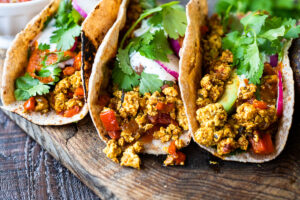 Vegan Breakfast Tacos with Mexican scrambled tofu, avocado, cilantro and pico de gayo.