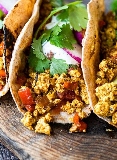 Vegan Breakfast Tacos with Mexican scrambled tofu, avocado, cilantro and pico de gayo.