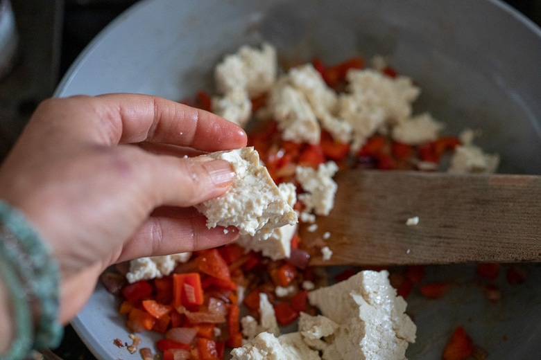 add it to the pan with the peppers and onions