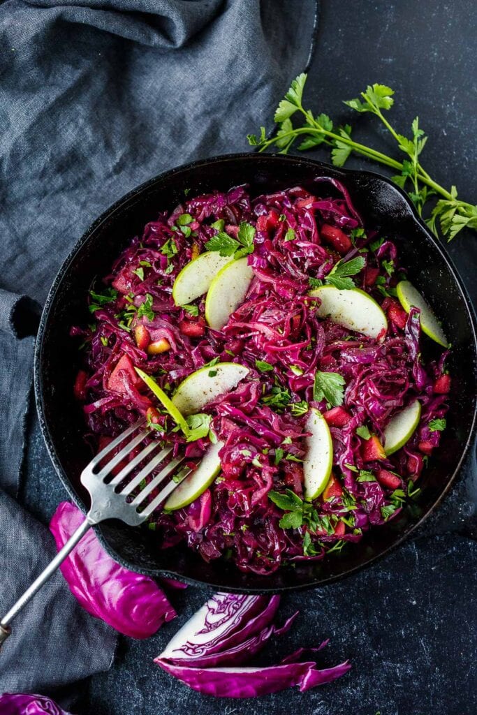 This Sautéed Cabbage recipe uses shredded cabbage, onion, and tart apples. It's a lovely German side dish with a delicious sweet-and-sour flavor.